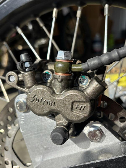 Custom Surron Ultra Bee Bracket for 203mm, 220mm, or 240mm rotor including modified front UB bracket